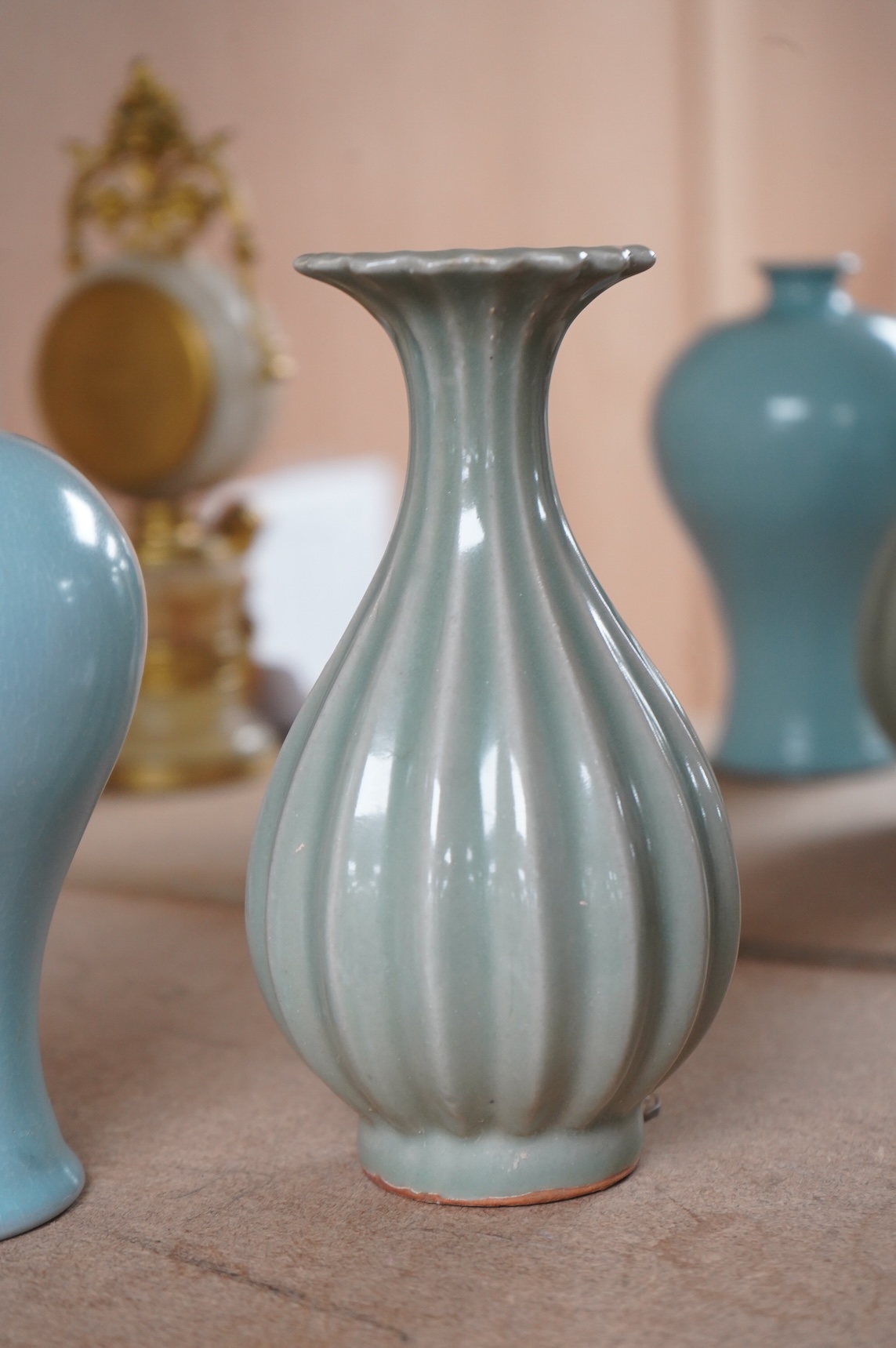 Two Chinese vases comprising a Meiping example and a celadon glazed example, largest 18cm high